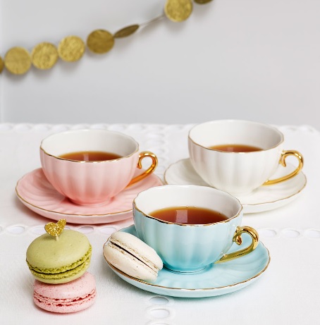 pastel teacups and macarons