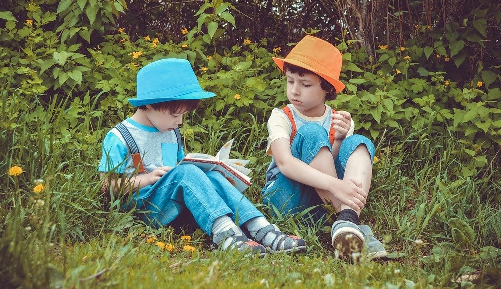 Young children learning outdoors