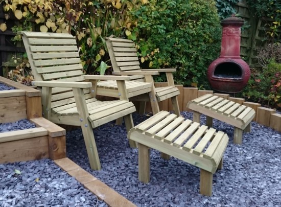 handmade conjoined wooden love seat positioned in garden